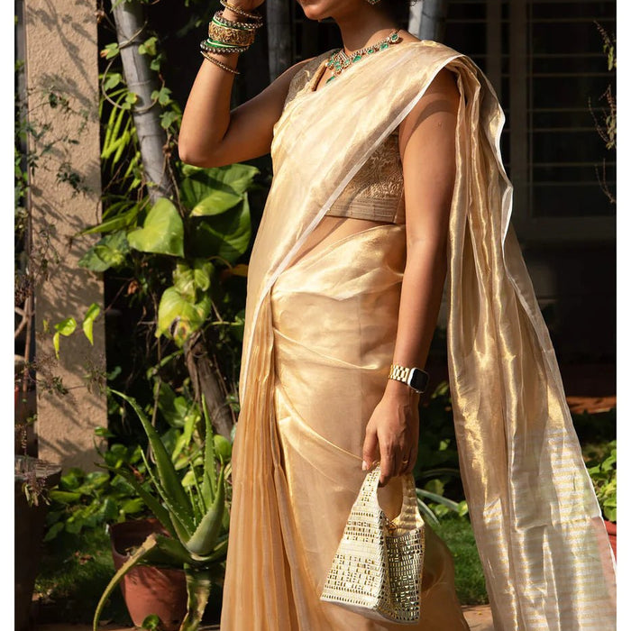 How to Care for Your Tissue Saree and Keep It Timelessly Beautiful - Seven Sarees